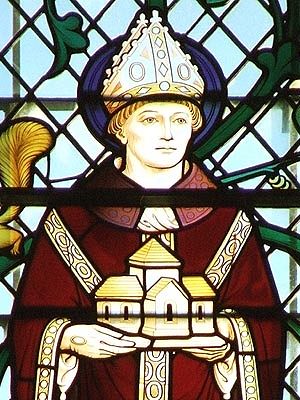 A stained glass image of St. Oswald of Worcester