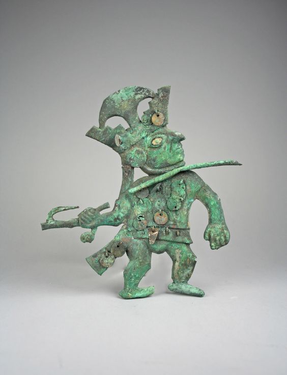 Gilded copper ornament of Moche warrior depicted in profile with spearthrower ca. 390-450 CE[2304x3012][OS]