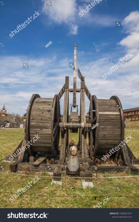 KIEV, UKRAINE - APRIL 14, 2019: Old  wooden trebuchet standing on battle field in "Kievan Rus'" historical park