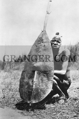 0092318-SUDAN-DINKA-WARRIORA-Dinka-warrior-in-southern-Sudan-Photographed-by-GN-Morhig-early-20th-century.jpg.f6bd7c0ee9c0099a0d76556dce2fd2c9.jpg