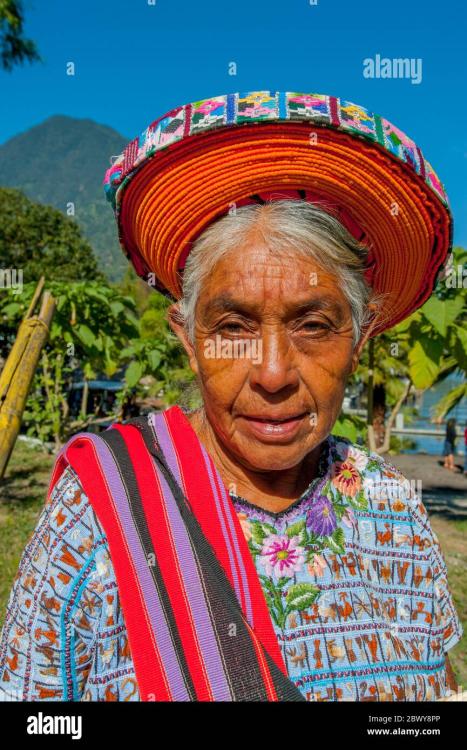 portrait-of-an-older-mayan-woman-in-traditional-dress-and-headdress-in-the-town-of-santiago-in-the-southwestern-highlands-of-guatemala-2BWY8PP.jpg