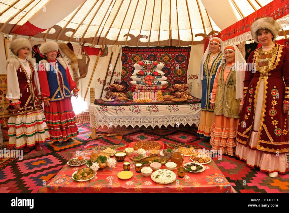 women-in-traditional-costume-bashkir-yurt-interior-sabantuy-festival-ATFTCH.jpg
